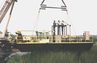 Kerr McGee Dredge Loading into Pond