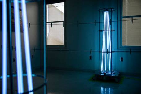 UV lights for disinfecting masks, which would hang on clothespins, at the University of Nebraska Medical Center in Omaha.